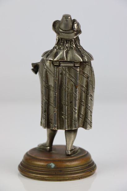null A partially silvered bronze inkwell or pyrogen, representing a bagpiper.

19th...