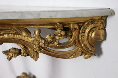 null A richly carved and gilded wood wall console, the belt decorated with doves...