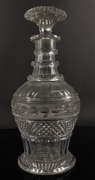 null CRYSTAL FACTORY OF THE CREUSOT.

Moulded and cut crystal decanter with frieze...