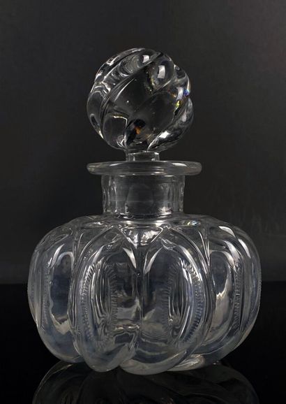null CRYSTAL FACTORY OF CREUSOT.

Moulded and cut crystal bottle with repeated cabochons.

First...