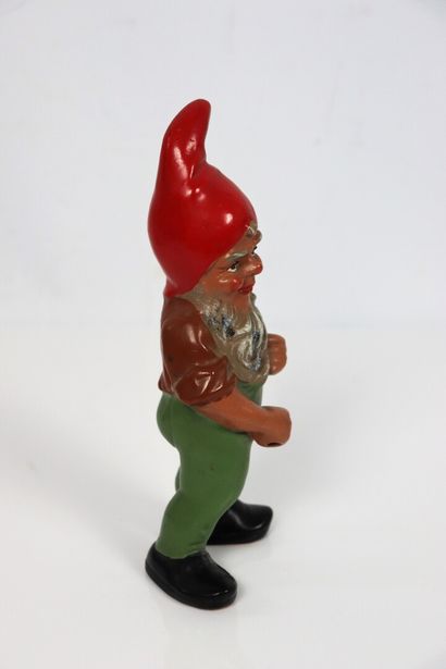null GERMANY.

Miniature garden gnome in polychrome terracotta.

Beginning of the...
