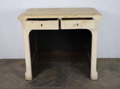 null 
Small white lacquered wood store counter with two drawers in the belt.




Circa...