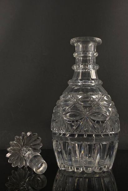 null CRYSTAL FACTORY OF THE CREUSOT.

Crystal decanter molded and cut with ribbons...