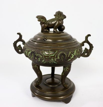 null INDOCHINA.

Bronze perfume burner with brown patina.

End of the 19th century.

H_23...
