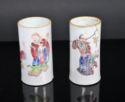 null CHINA.

Pair of polychrome porcelain brush pots with characters.

Mark with...