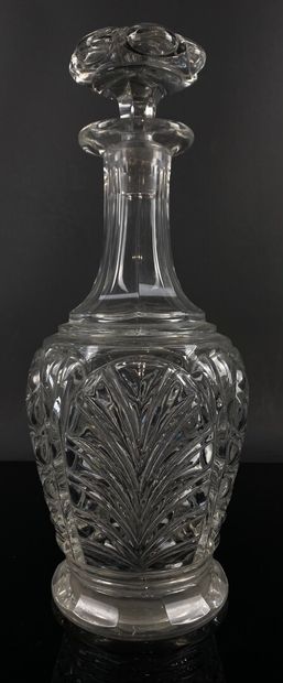 null BACCARAT.

A moulded crystal decanter with palms decoration.

XIXth century.

Marked.

H_28...
