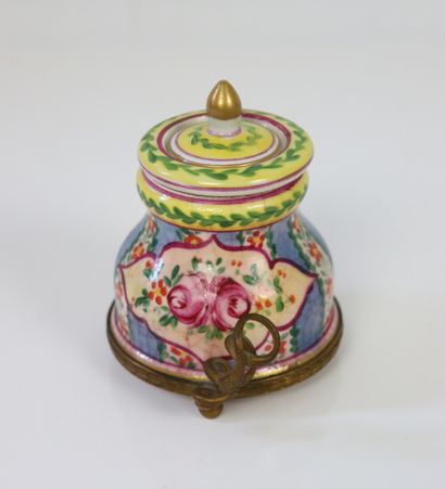 null Two polychrome porcelain inkwells, one circular in the Louis XVI style, the...