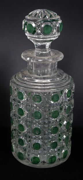 null BACCARAT.

Toilet set in crystal partially tinted green, including four bottles,...