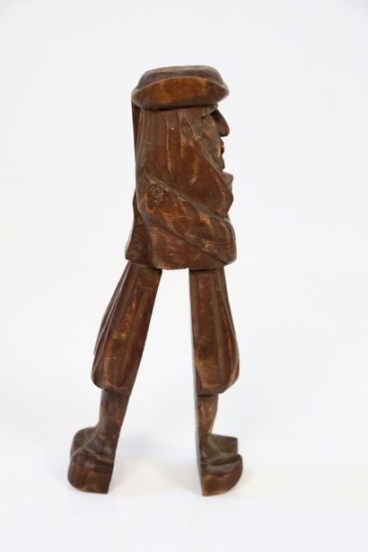 null Casse-noix et statuette en bois sculpté et peint.

L_18,5 cm et H_12 cm, éc...