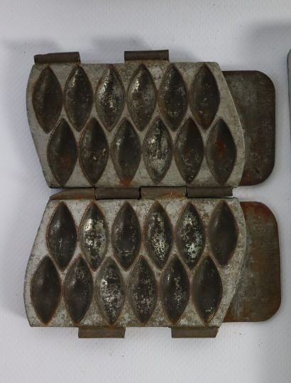 null LETANG FILS Paris.

Set of chocolate moulds in the shape of cocoa beans, pipes,...