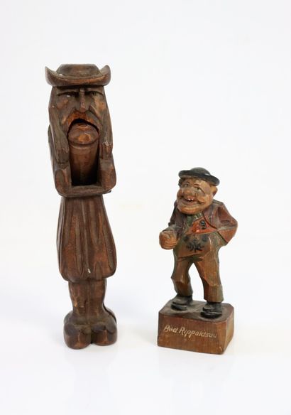 null Nutcracker and statuette in carved and painted wood.

L_18,5 cm and H_12 cm,...