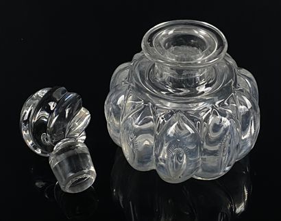 null CRYSTAL FACTORY OF CREUSOT.

Moulded and cut crystal bottle with repeated cabochons.

First...