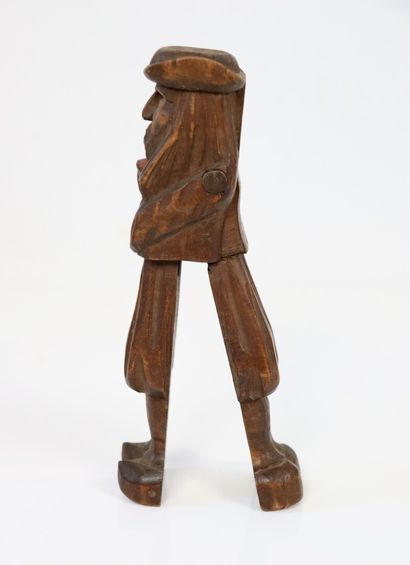 null Casse-noix et statuette en bois sculpté et peint.

L_18,5 cm et H_12 cm, éc...