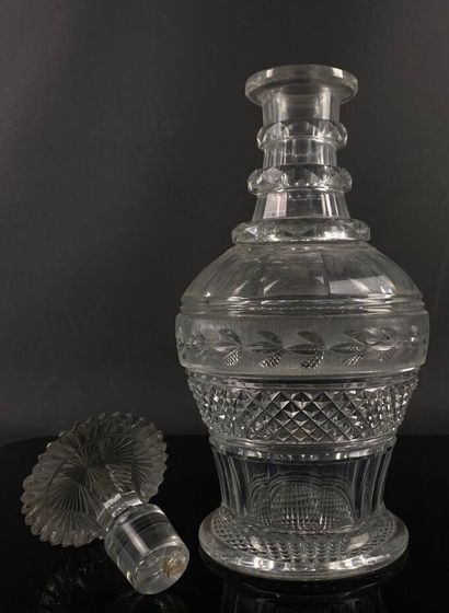 null CRYSTAL FACTORY OF THE CREUSOT.

Moulded and cut crystal decanter with frieze...