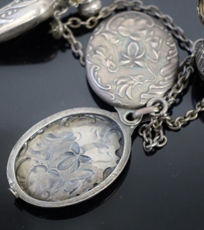 null Silver set including a chain holding a pocket mirror, two bottles and a powder...