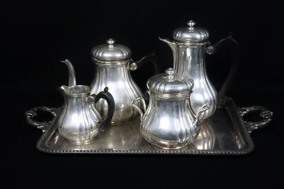null Service à thé et café en métal argenté, comprenant :

- une théière

- une cafetière

-...