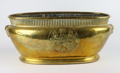 null Brass planter decorated on the body with a coat of arms, the handles formed...