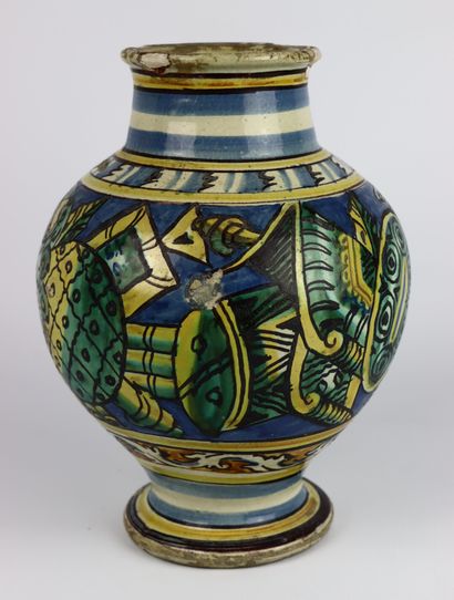 null SICILY.

Earthenware pharmacy vase decorated with a religious in a medallion.

XVIIth...