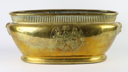 null Brass planter decorated on the body with a coat of arms, the handles formed...