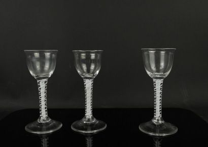 null Suite of three glasses in the English way, the leg with white twist. 

Round...