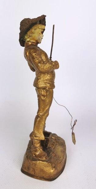 null O.S. TREM.

Le petit pêcheur.

Sculpture en bronze doré, le visage et une main...