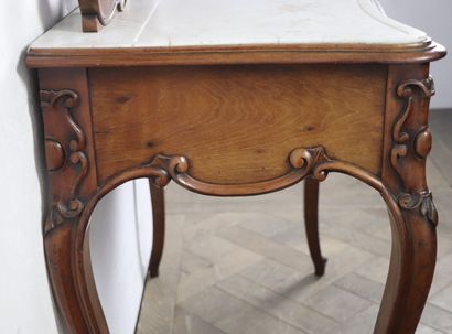 null Moulded and carved mahogany dressing table opening to a drawer in front. White...