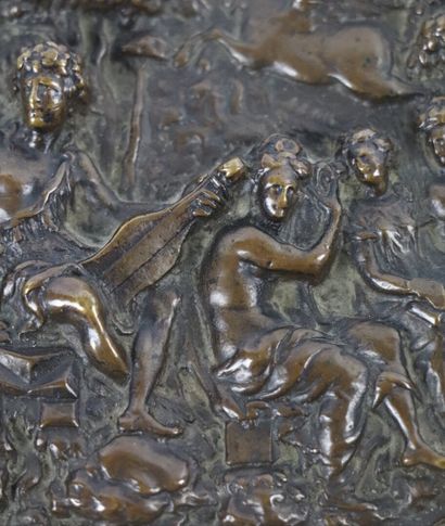 null Oval plaque in patinated bronze representing Apollo among the nine Muses. 

Old...