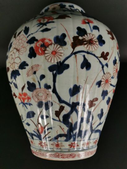 null 
JAPAN.




Porcelain vase and cover with polychrome relief decoration of flowers...