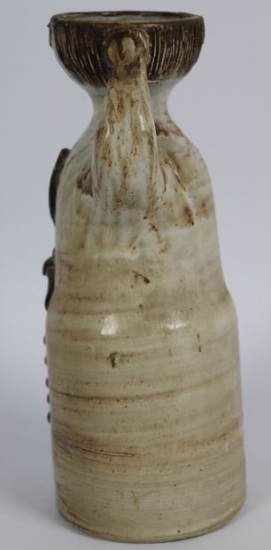 null Jacques POUCHAIN (1925-2015), workshop DIEULEFIT.

Anthropomorphic vase in glazed...