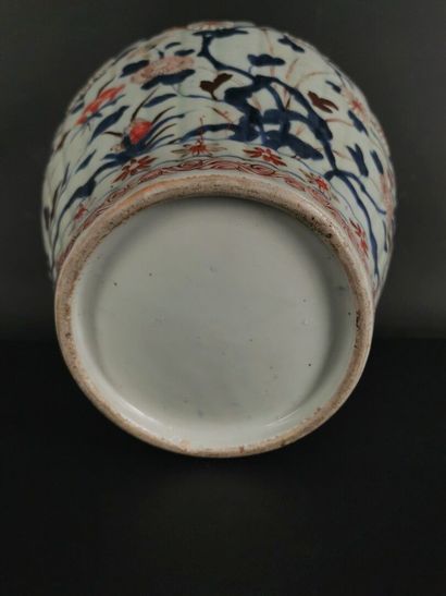 null 
JAPAN.




Porcelain vase and cover with polychrome relief decoration of flowers...