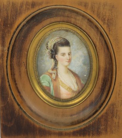 null T. CHOLET (active in the 19th century)

Young oriental girl.

Oval miniature...