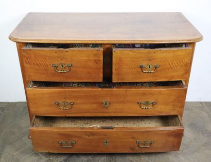 null A walnut chest of drawers with four drawers on three rows. 

The ormolu grips...