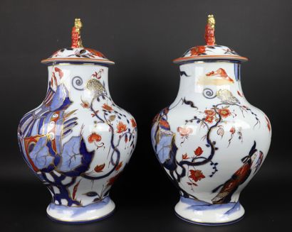 null BAYEUX, Widow LANGLOIS.

Pair of porcelain baluster pots with red, blue and...