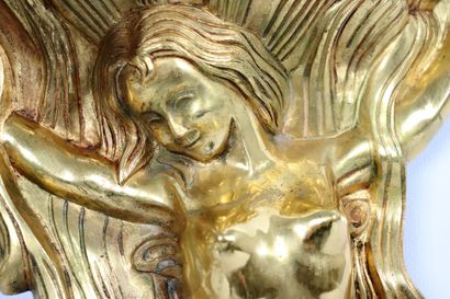 null Paire d'appliques en bronze doré à décor de sirène soutenant une vasque coquillage.

H_36,5...