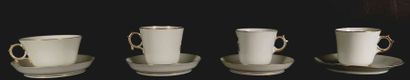 null SEVRES and PARIS.

Set of four cups and four saucers in porcelain with gold...