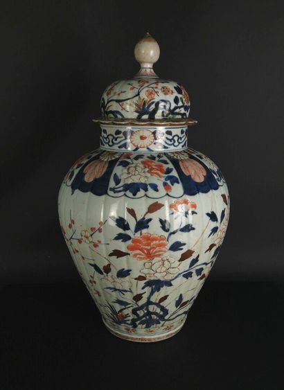 null 
JAPAN.




Porcelain vase and cover with polychrome relief decoration of flowers...