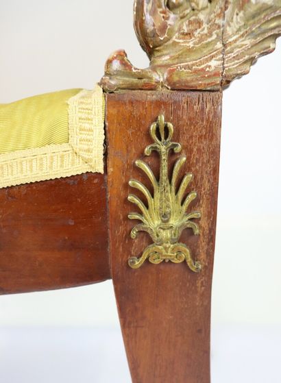 null Curved stool in varnished moulded wood with stuccoed gilt decoration of dolphins...