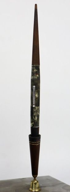 null Onyx penholder supporting an ebony elephant sculpture and ivory tusk, as well...