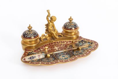 null An ormolu and polychrome cloisonné enamel inkwell with a profusion of foliage.

It...