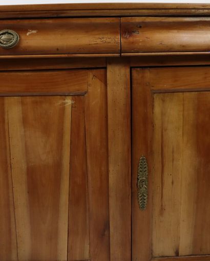 null Moulded and carved cherry wood sideboard opening to three drawers and three...