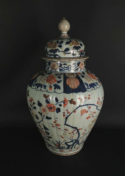 null 
JAPAN.




Porcelain vase and cover with polychrome relief decoration of flowers...