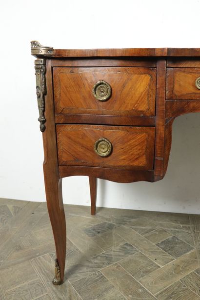 null Antique desk in veneer marquetry opening to four drawers, distributed on two...