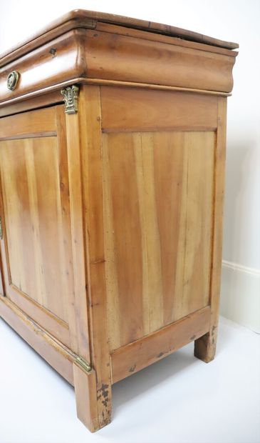 null Moulded and carved cherry wood sideboard opening to three drawers and three...