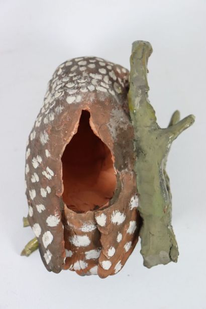 null 
Sylverstria, in the taste of. 





Owl in polychrome terra cotta forming a...