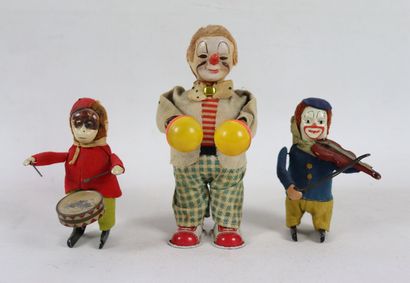 null Ensemble de six jouets mécaniques sur le thème du cirque comprenant :

- deux...