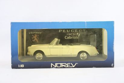 null NOREV. 

Peugeot 404 cabriolet beige au 1/18ème. 

Dans sa boîte d'origine,...