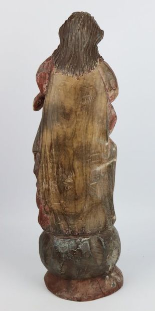 null Vierge en bois sculpté et peint.

Probablement GOA.

XVIIIème siècle.

H_47...
