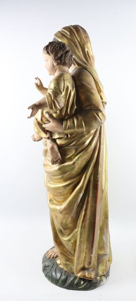 null Vierge à l'enfant en bois stuqué polychrome et doré. 

XIXème siècle. 

H_89...