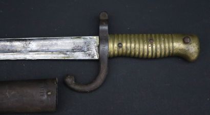 null Baïonnette Chassepot, modèle 1866.

Lame de 57,5 cm. 

Marque au talon : P entourée....