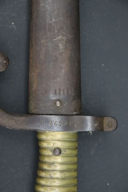 null Baïonnette Chassepot, modèle 1866.

Lame de 57,5 cm. 

Marque au talon : P entourée....